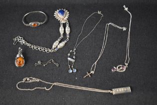 A small selection of silver and white metal jewellery including Mexican necklace with lapis lazuli