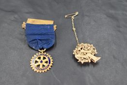 Two 9ct gold club brooches including Women's Institute & Chorley Rotary club, approx 18g gross