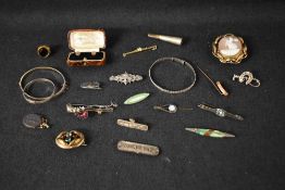 A small selection of silver, white metal and pinchbeck jewellery including collar studs, brooches,