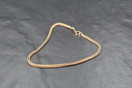 A 9ct gold snake link bracelet, approx 1.7g