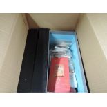 BOX WITH HUNDREDS OF PACKETS OF WORLD STAMPS, MINT AND USED Box with several smaller boxes and