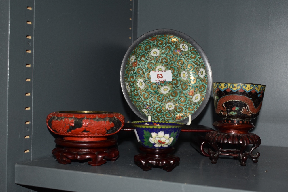 A 20th Century Japanese porcelain bowl, decorated with a repeating foliate design against a