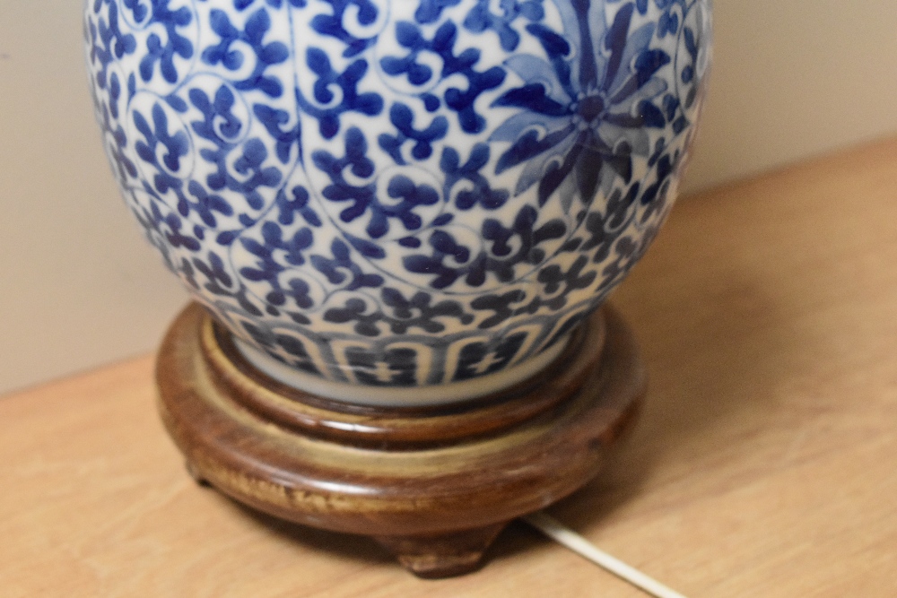 A 20th Century Chinese blue and white porcelain converted table lamp, decorated with a dragon and - Image 12 of 16
