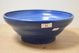 A 20th Century Susie Cooper design footed fruit bowl, glazed in blue and with a banded design,