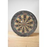 A vintage Supabull dart board