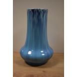 An early 20th Century blue drip glazed vase, of cylindrical squat form, possibly Burmantofts of