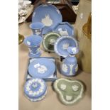 A collection of Wedgwood Jasperware, including pin dishes, vase, trinket box and Christmas 1989