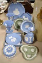 A collection of Wedgwood Jasperware, including pin dishes, vase, trinket box and Christmas 1989