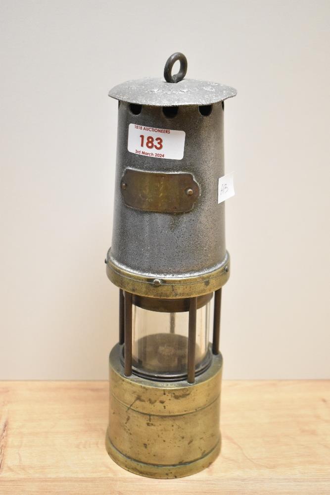 A traditional miners safety lamp.