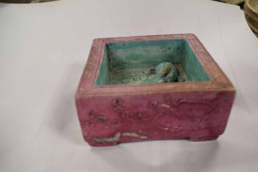 An Oriental square ceramic ashtray or trinket pot, having pink and blue ground with raised Koi - Image 4 of 7