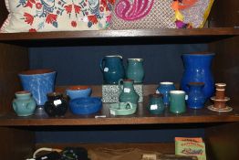 A collection of Wetheriggs Pottery, Penrith, including planters, jugs, vases, candle holders etc, in
