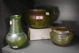 Three 20th Century Loetz and Kralik glass vases, the largest measures 16cm tall