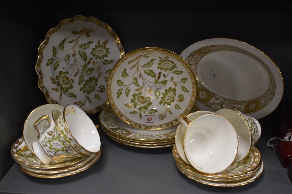 A Royal Crown Derby 'Green Derby Panel' patterned part tea service, comprising teacups, saucers,