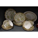 A Royal Crown Derby 'Green Derby Panel' patterned part tea service, comprising teacups, saucers,