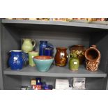 A collection of Wetheriggs Pottery, Penrith, planters, salt pig, vases and jugs etc, mostly plain