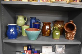 A collection of Wetheriggs Pottery, Penrith, planters, salt pig, vases and jugs etc, mostly plain