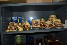 A collection of Aynsley Orchard Gold patterned items, with boxes, to include a lidded ginger jar,