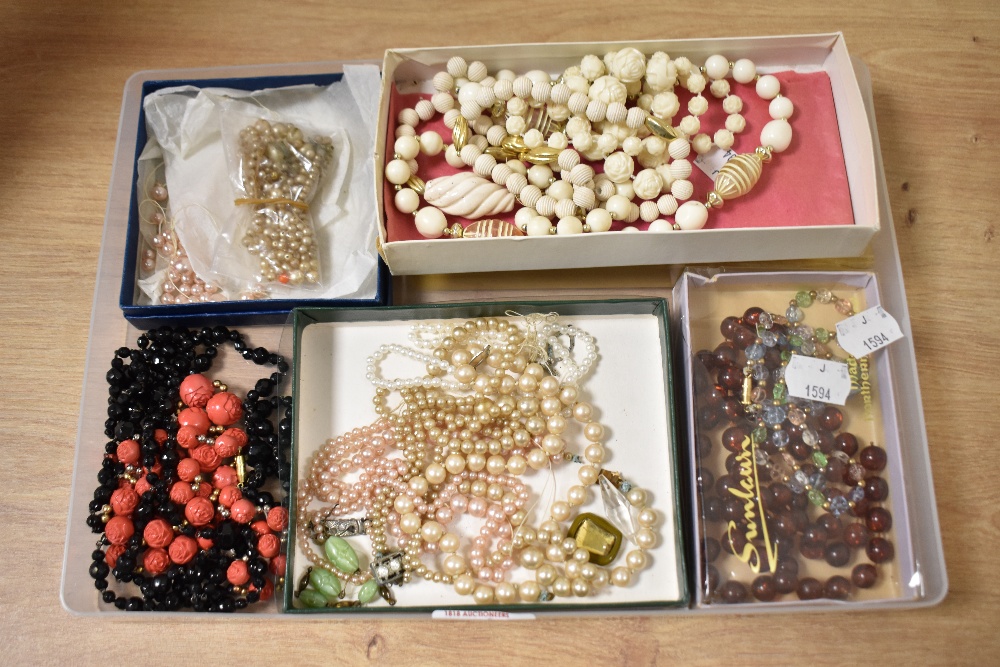 A collection of vintage costume necklaces.