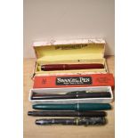 A selection of fountain pens, An Osmiroid 65, a Burnahm No 5, a Dorothy dipping pen from Boots