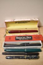 A selection of fountain pens, An Osmiroid 65, a Burnahm No 5, a Dorothy dipping pen from Boots