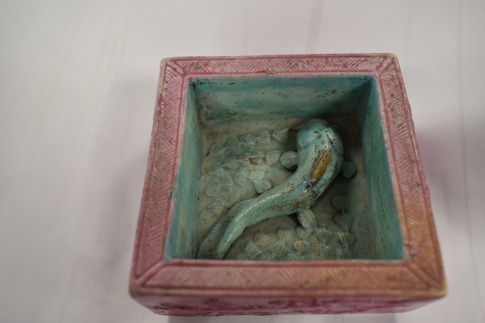 An Oriental square ceramic ashtray or trinket pot, having pink and blue ground with raised Koi - Image 5 of 7