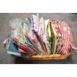 A basket full of high quality fabrics, perfect for patchwork, crafts and projects, including Laura