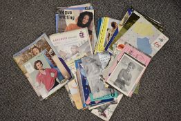 A collection of vintage knitting patterns, including men's, women's and children's.