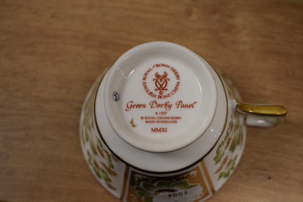 A Royal Crown Derby 'Green Derby Panel' patterned part tea service, comprising teacups, saucers, - Image 2 of 3