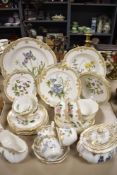 A selection of Spode 'Staffordshire Flowers' cups, saucers, plates, sugar basin and jug.