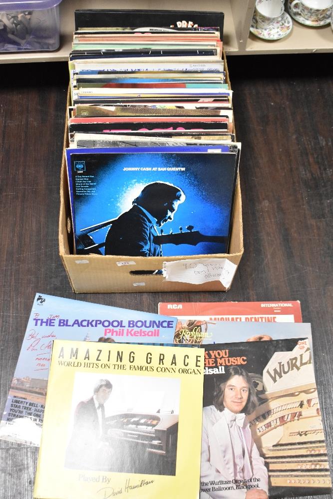 Approximately ninety easy listening LP records, including Four tops and Johnny cash.