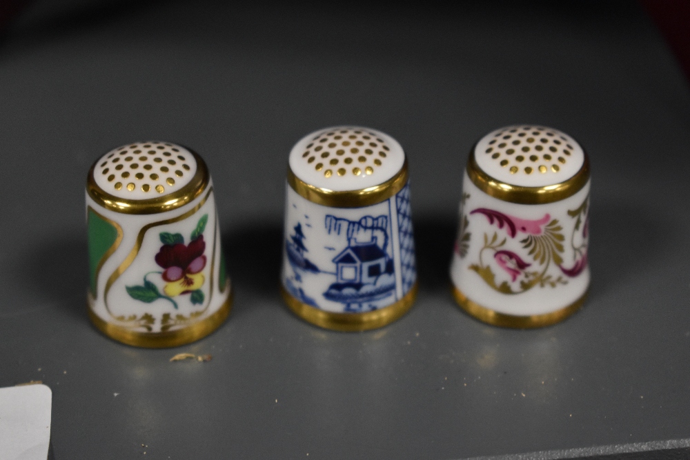 A collection of Royal Crown Derby porcelain collector's thimbles, with boxes, and informative guide - Image 3 of 3