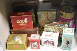 A selection of vintage advertising tins, including OXO and Quality street.