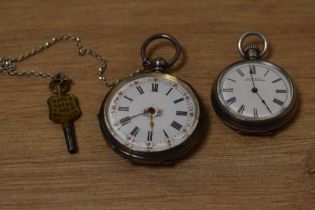 A small Victorian silver key wound pocket watch having Roman numeral dial to decorative face in an