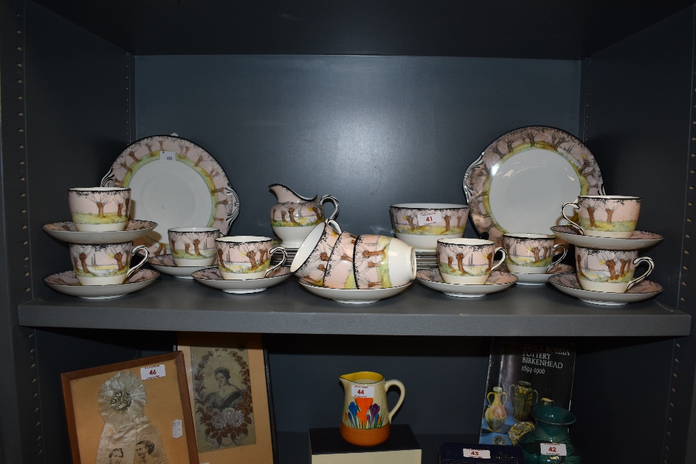 An Art Deco Royal Doulton tea set, in the Pollard Willow pattern, comprising two sandwich plates,