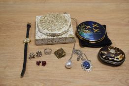 Two mid-20th Century Stratton powder compacts, one with flying mallard design, a tortoiseshell