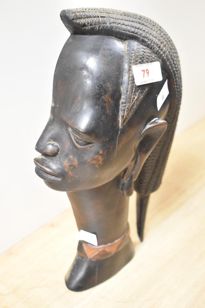 A heavy and intricately carved heavy hardwood African bust. - Image 2 of 2