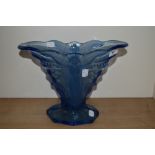 An Art Deco frosted blue glass vase, relief moulded with a winged lady, measuring 22cm tall