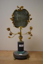 A reproduction gilt metal mounted face screen, of French style, having onyx base and column, and