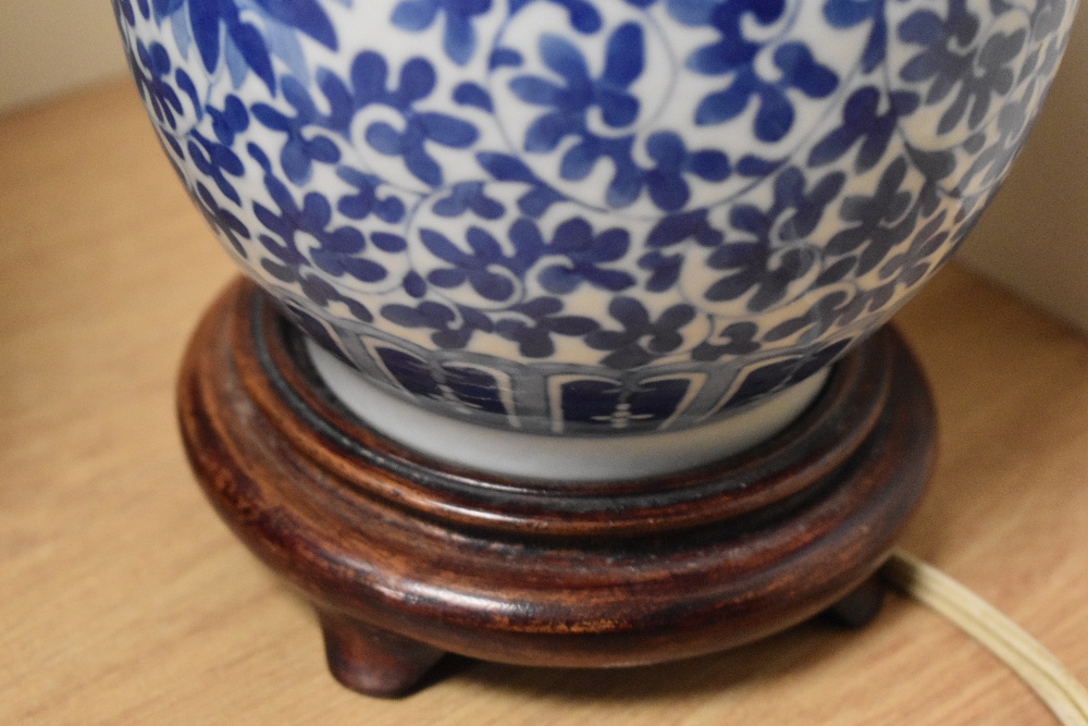 A 20th Century Chinese blue and white porcelain converted table lamp, decorated with a dragon and - Image 13 of 16