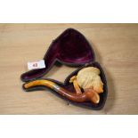 A 19th Century Meerschaum pipe, the bowl modelled as an elegant lady, measuring 15cm long,