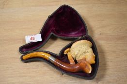 A 19th Century Meerschaum pipe, the bowl modelled as an elegant lady, measuring 15cm long,