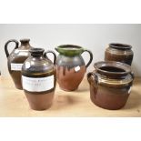 Five items of Victorian Wetheriggs pottery, Penrith, including barley wine flask and wine flask.