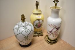 Three lamp bases, comprising yellow ceramic lamp with floral decoration, vintage crackle glazed