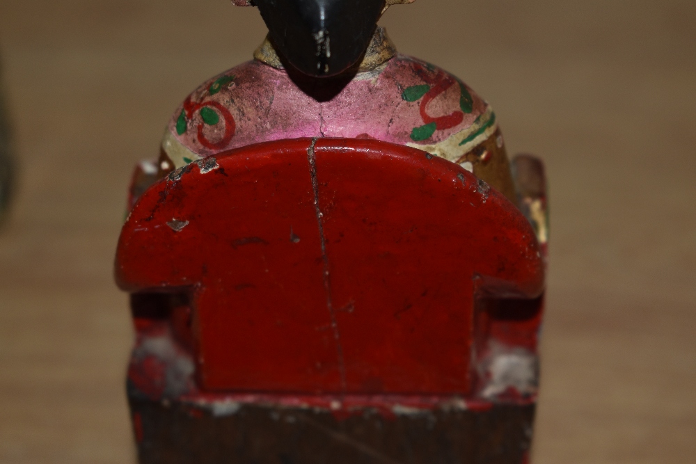 A Chinese carved and polychrome painted wooden figurine and a dog of Foo. - Image 2 of 2