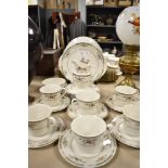 A Royal Doulton 'Kingswood' set of cups and saucers, cake plate, side plates, jug and sugar basin,