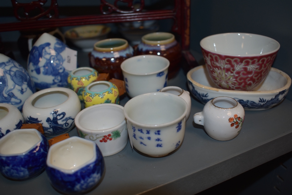 A selection of oriental ceramics,including tea bowls, and miniature cups, some of which are housed - Image 2 of 5