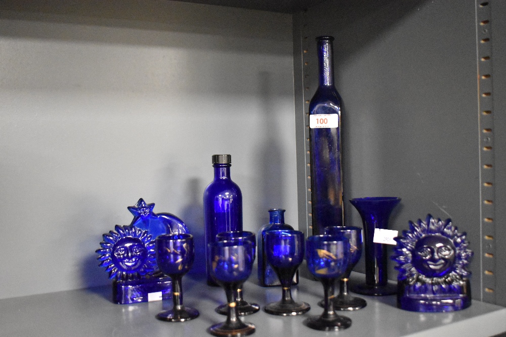 A collection of Victorian Bristol Blue glassware, to include two votive sun and moon candle holders,