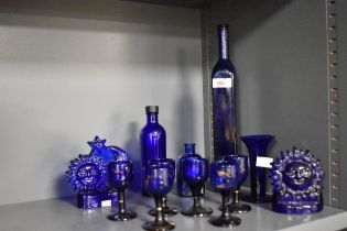 A collection of Victorian Bristol Blue glassware, to include two votive sun and moon candle holders,