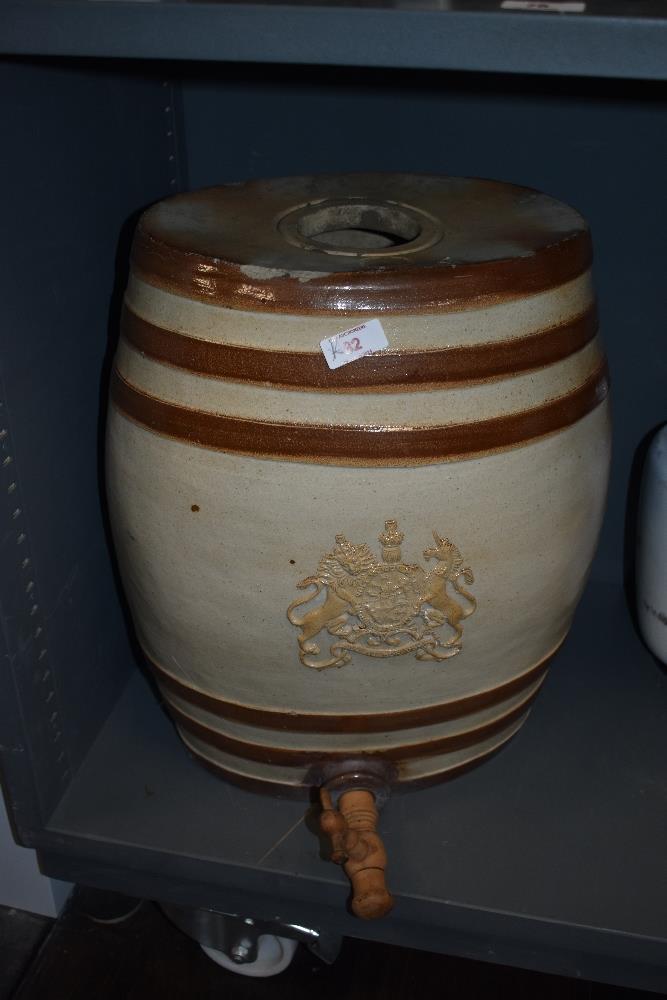 A Victorian Doulton and Watts glazed stoneware spirit barrel, having Royal cipher with lion and