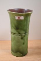 An early 20th Century Schofield Pottery of Penrith earthenware vase, of cylindrical form with flared